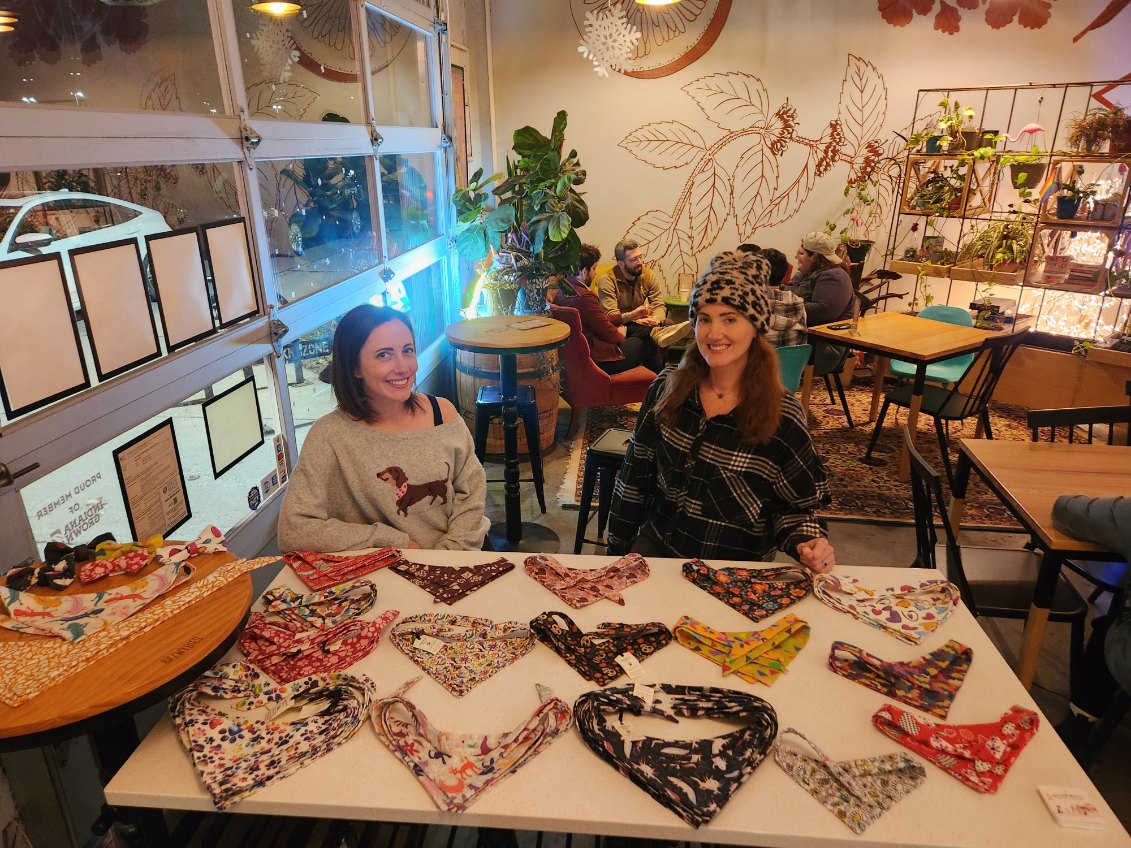 Chewla founder with bandanas on display at 8th Day Distillery